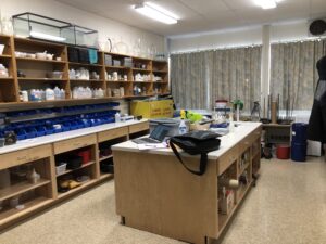 science lab with shelving against wall