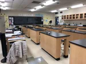 science lab. chalkboard is visible in the front of the classroom