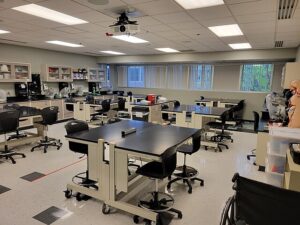 well lit Science Classroom with desks and chairs