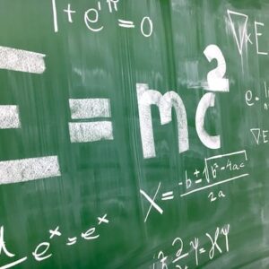 E=mc2 on chalkboard